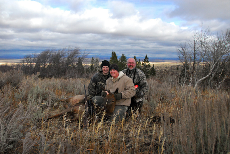 group posing with elk