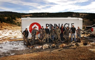 group posing with elks and horns