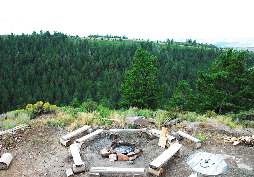 fire pit and view of hills