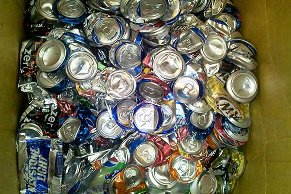 box of crushed cans