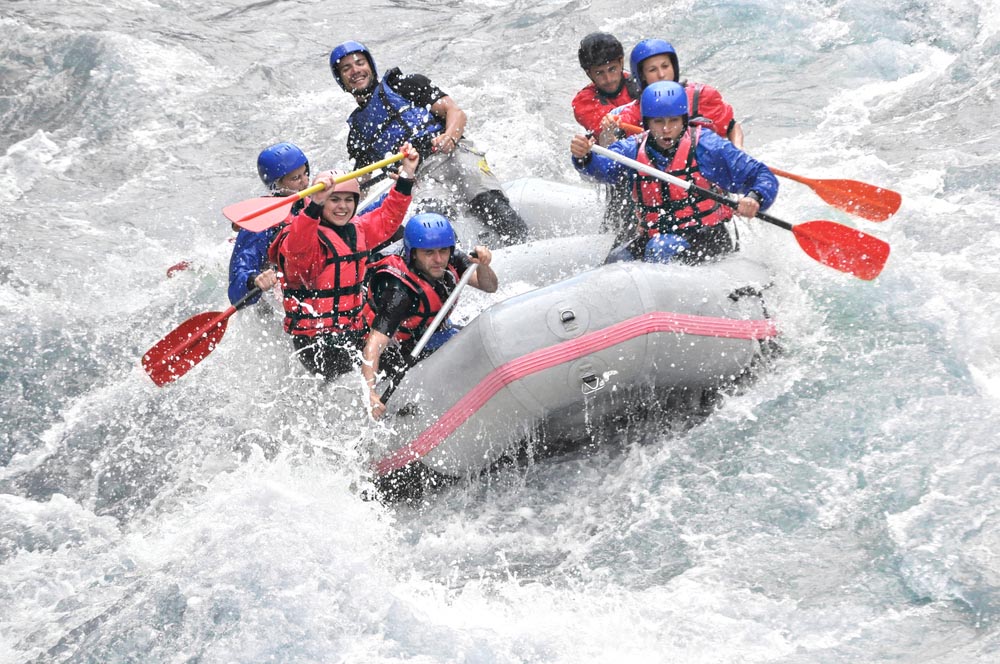 Group whitewater rafting.