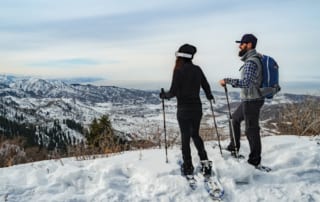 Skiers on top of a hill