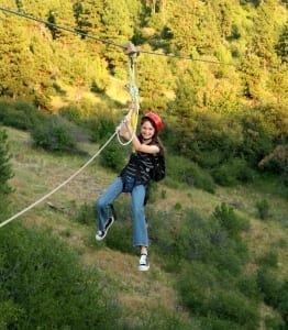 Photo of a Teenager Ziplining. Click Here to Learn More About our Idaho Family Vacations.