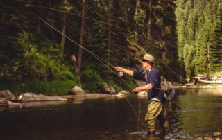 A man fly fishing in Idaho