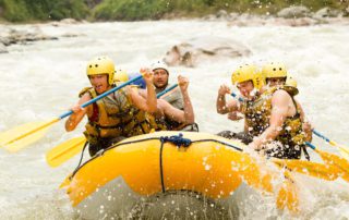 Vacationers on a whife water rafting excursion in Idaho